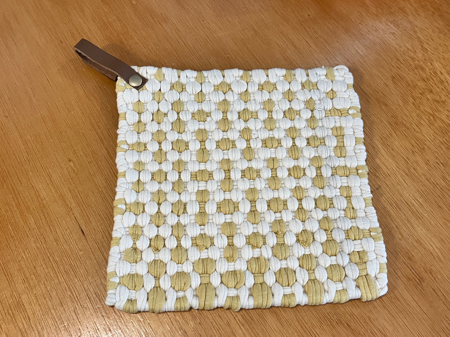 2 color woven pot holders, leather strap